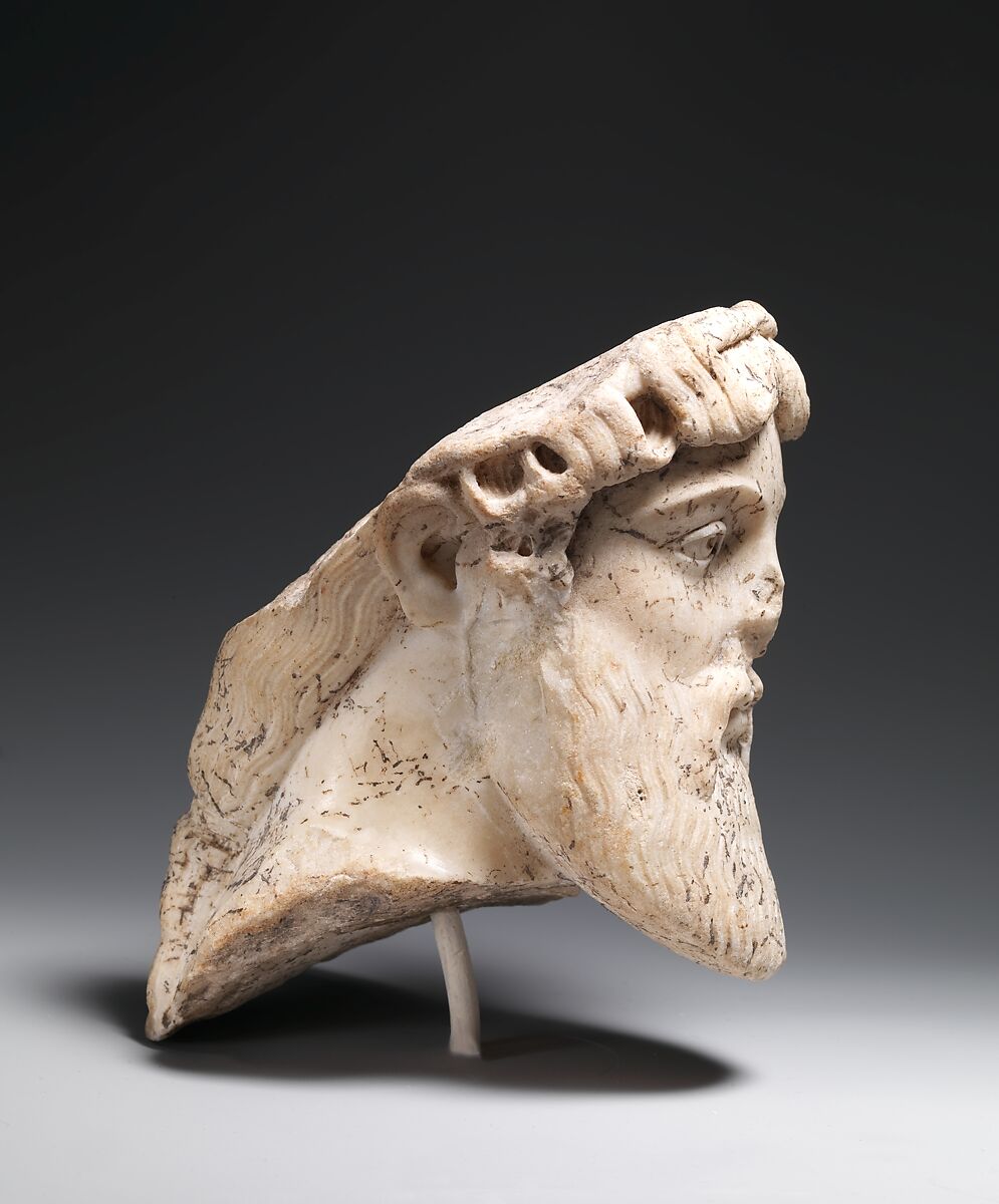 Marble head of a god, probably Dionysos, Marble, Roman