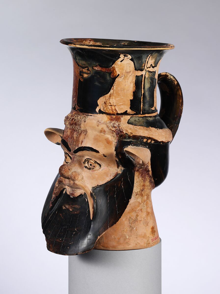 Terracotta mug in the form of a satyr's head, Attributed to the Carlsruhe Painter, Terracotta, Greek, Attic