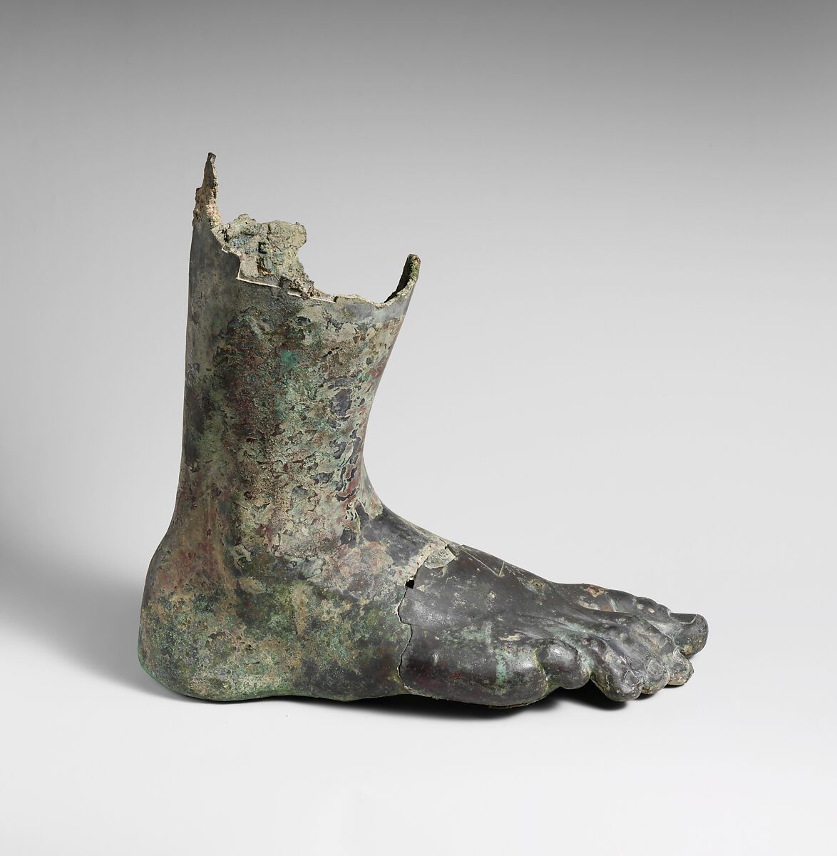 Bronze right foot and lower leg from a colossal statue, Bronze, Roman 