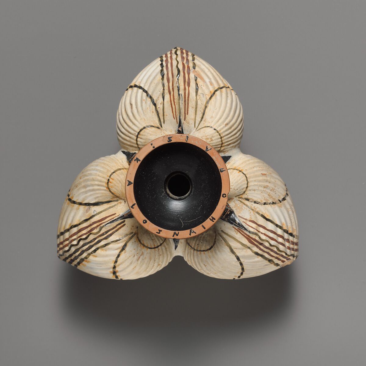 Terracotta aryballos (oil flask) in the form of three cockleshells, Terracotta, Greek, Attic