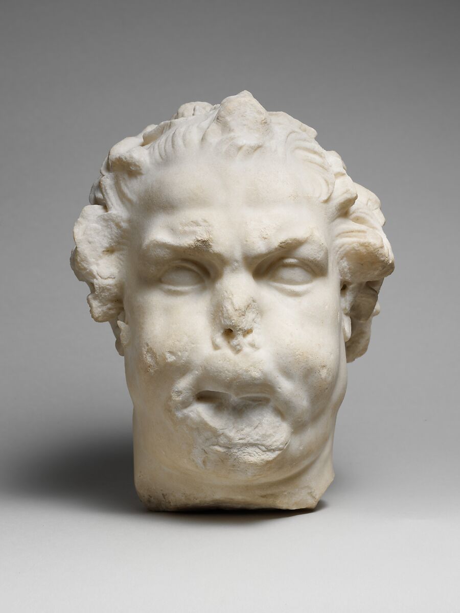 Marble head of a satyr playing the double flute, Marble, Roman 