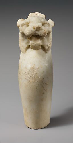 Marble leg of a table with a tiger's head