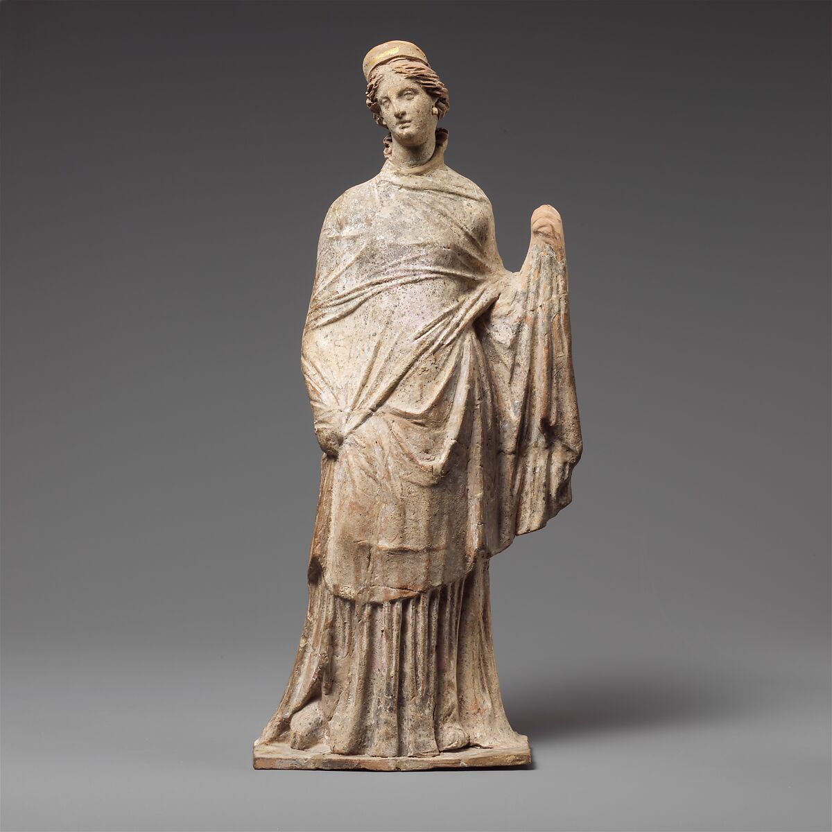 Terracotta statuette of a draped woman, Terracotta, Greek, Asia Minor 