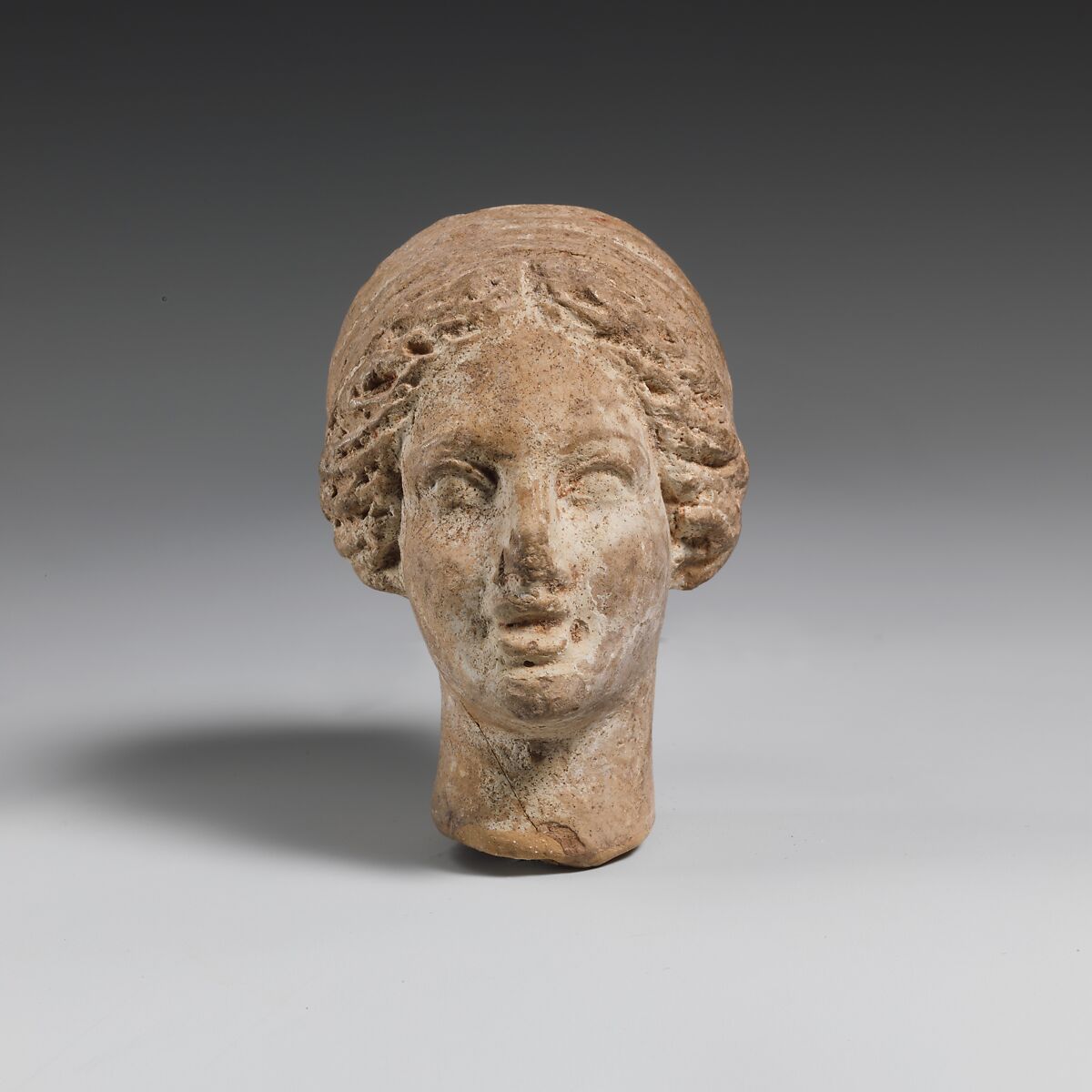 Terracotta head of a woman, Terracotta, Greek, South Italian (?) 