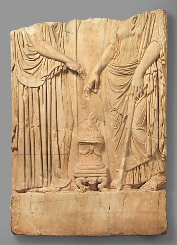 Lower part of a marble relief with two goddesses