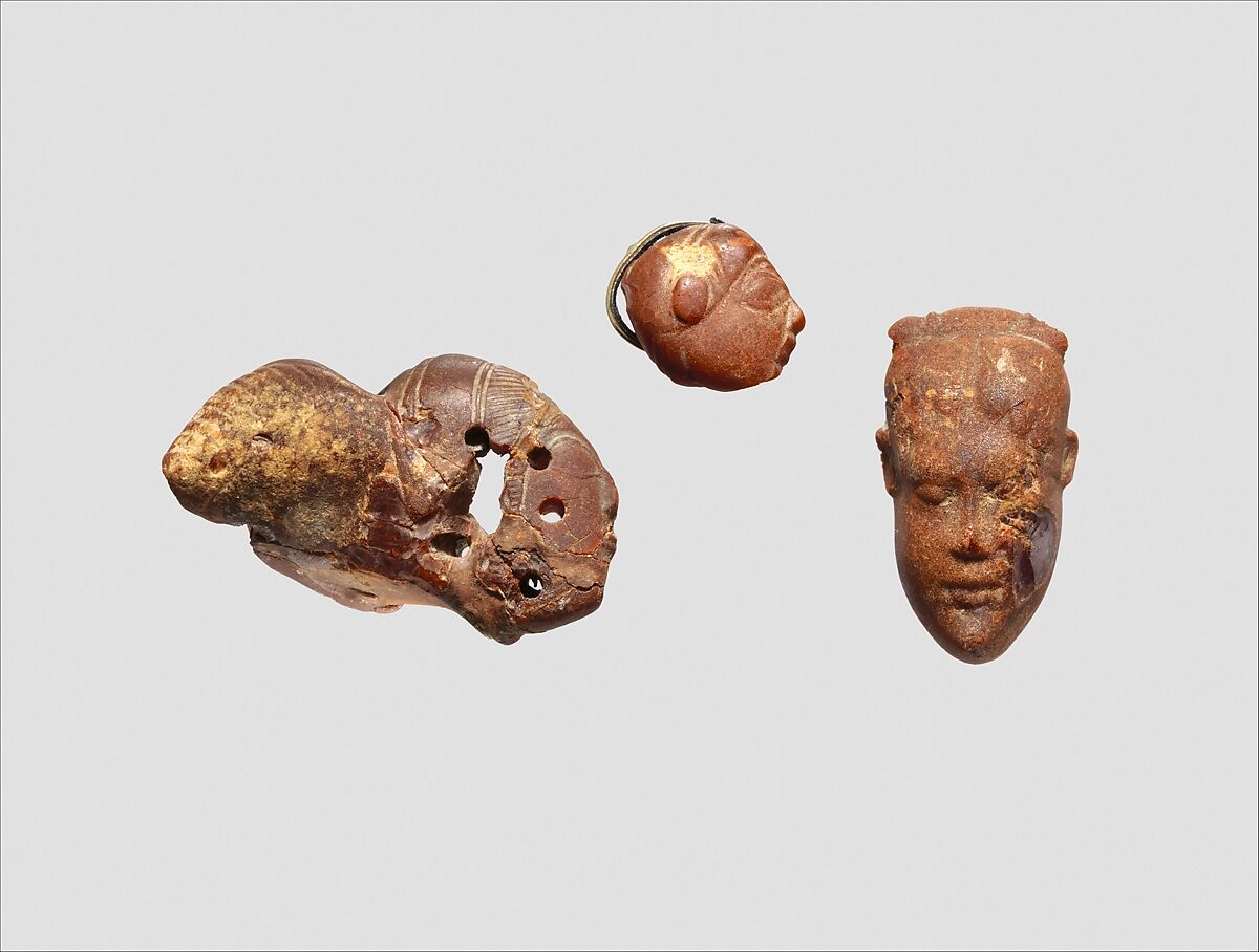 Pendant: winged female head, Amber, Italic