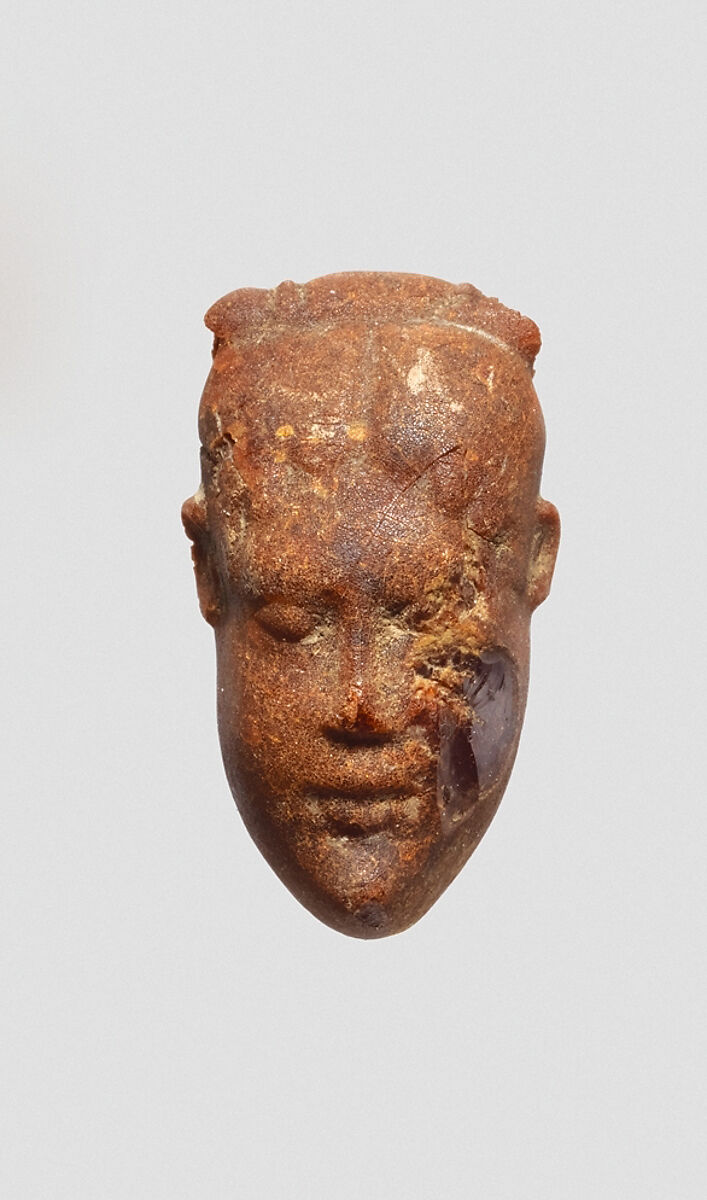 Pendant: head of a woman, Amber, Etrusco-Campanian 