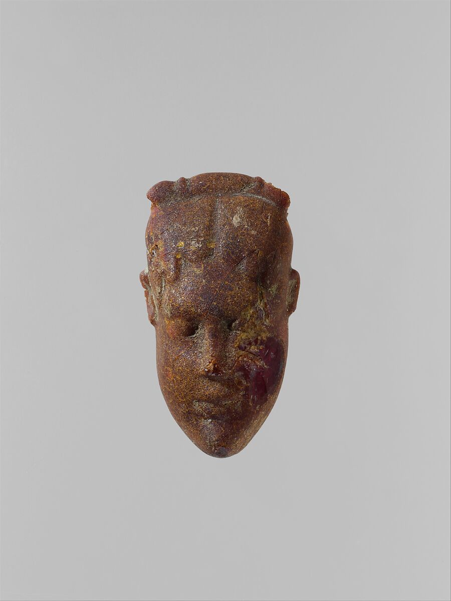 Pendant: head of a woman, Amber, Etrusco-Campanian