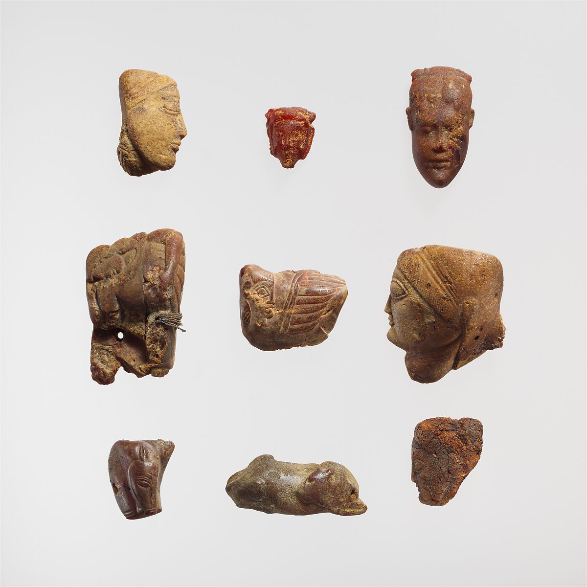 Pendant: head of a woman, Amber, Etrusco-Campanian