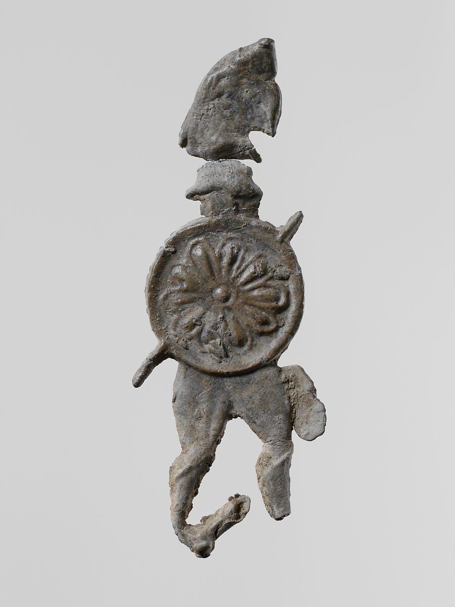 Lead figure of a warrior with a helmet and shield, Lead, Greek, Laconian 