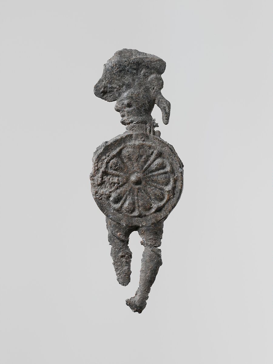 Lead figure of a warrior with a helmet and shield, Lead, Greek, Laconian 