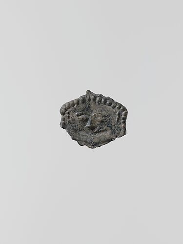 Lead ornament in the form of a gorgoneion (gorgon's face)