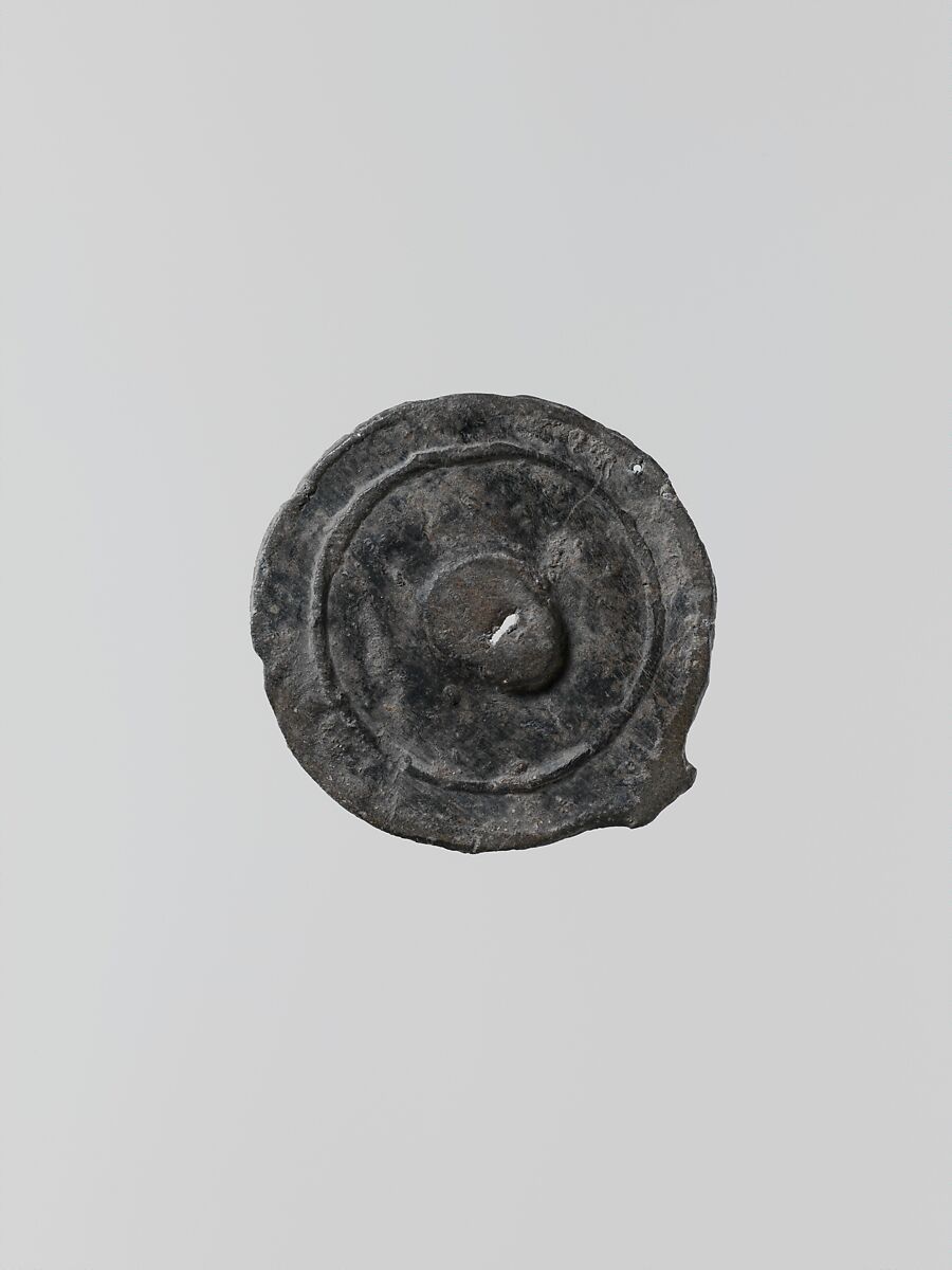 Lead disk with a hole in the center, Lead, Greek, Laconian 