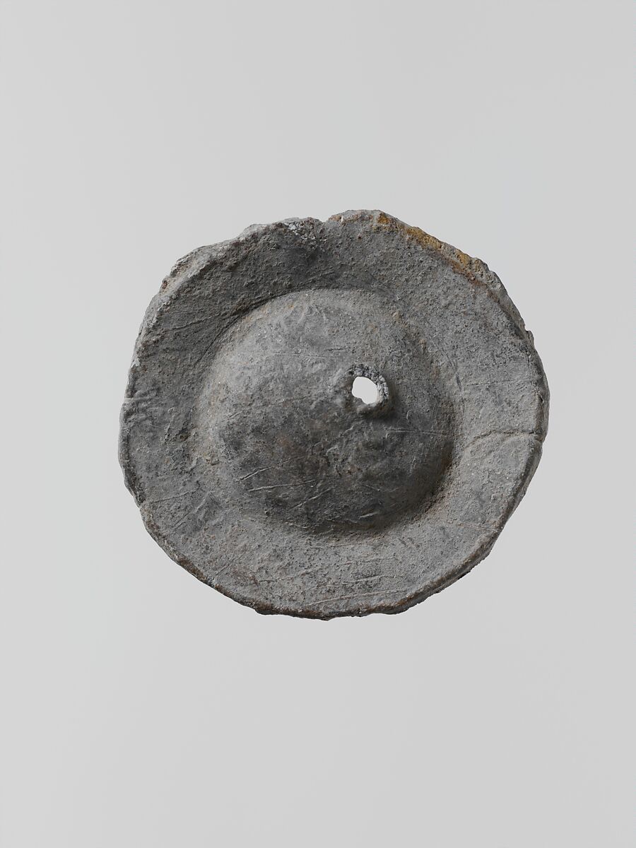Lead disk with a hole in the center, Lead, Greek, Laconian 