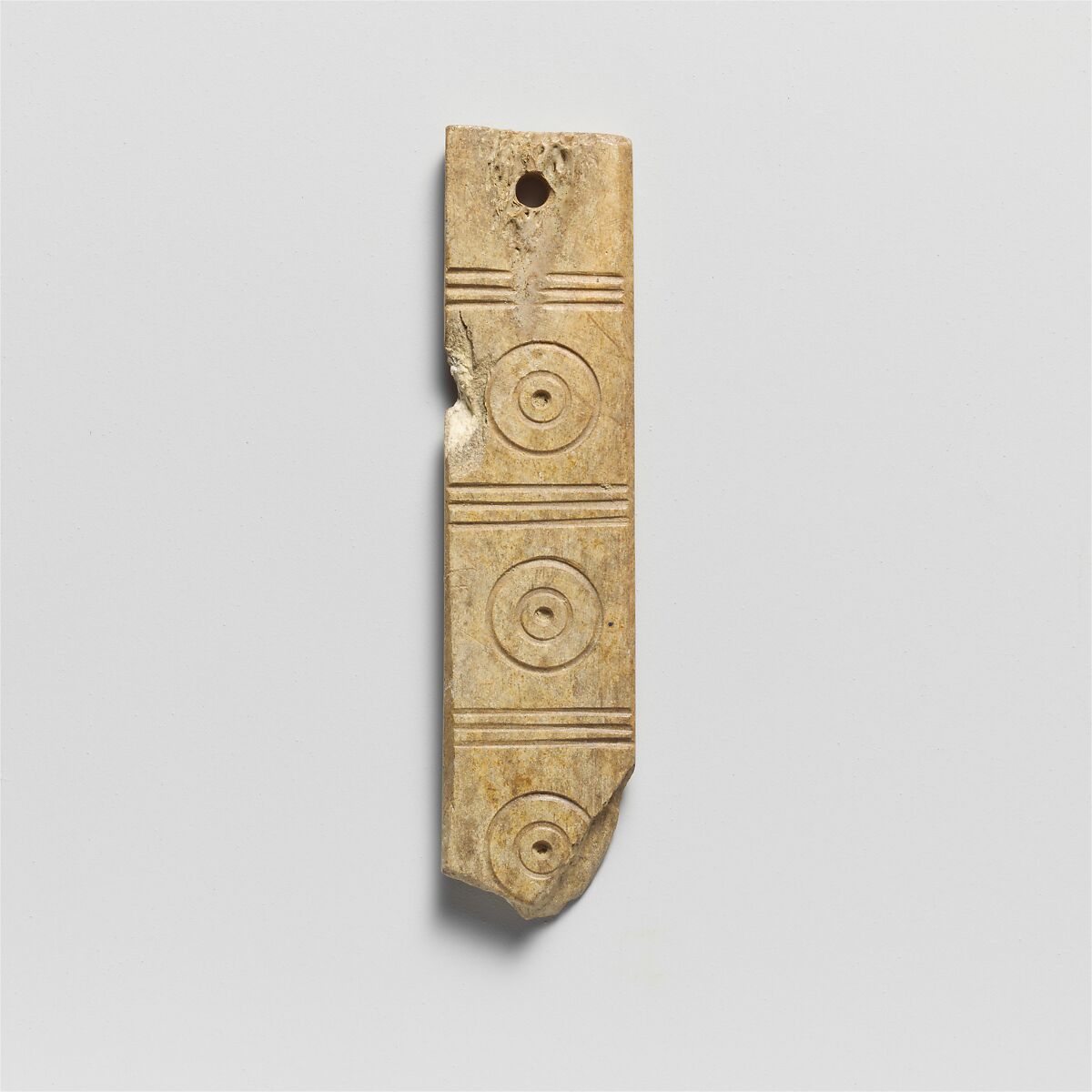 Bone plaque with a hole at one end, Ivory, Greek, Laconian 