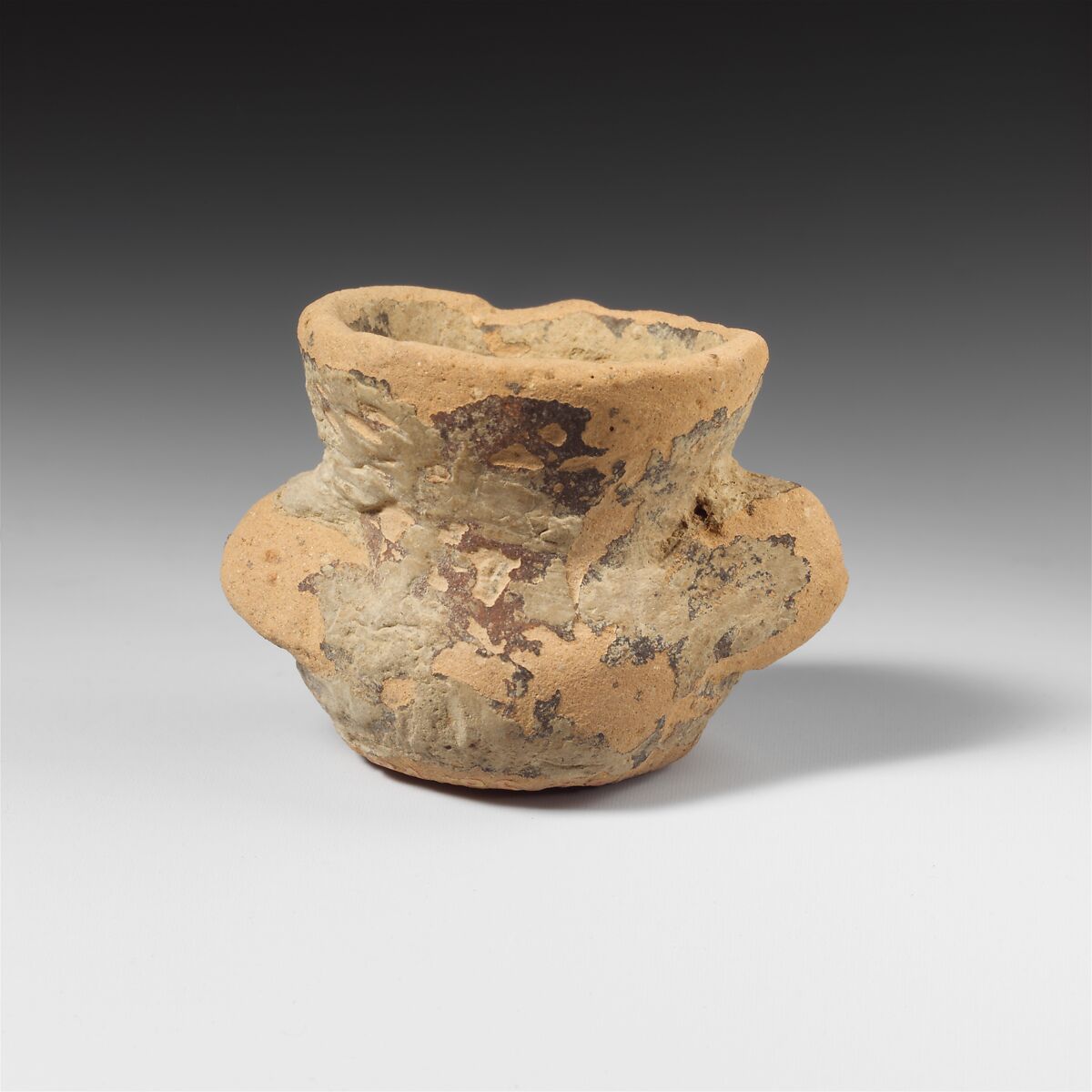 Terracotta miniature vase with rudimentary handles, Terracotta, Greek, Laconian 