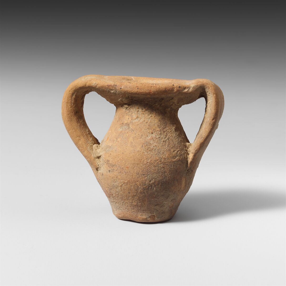 Terracotta miniature jar with two handles, Terracotta, Greek, Laconian 