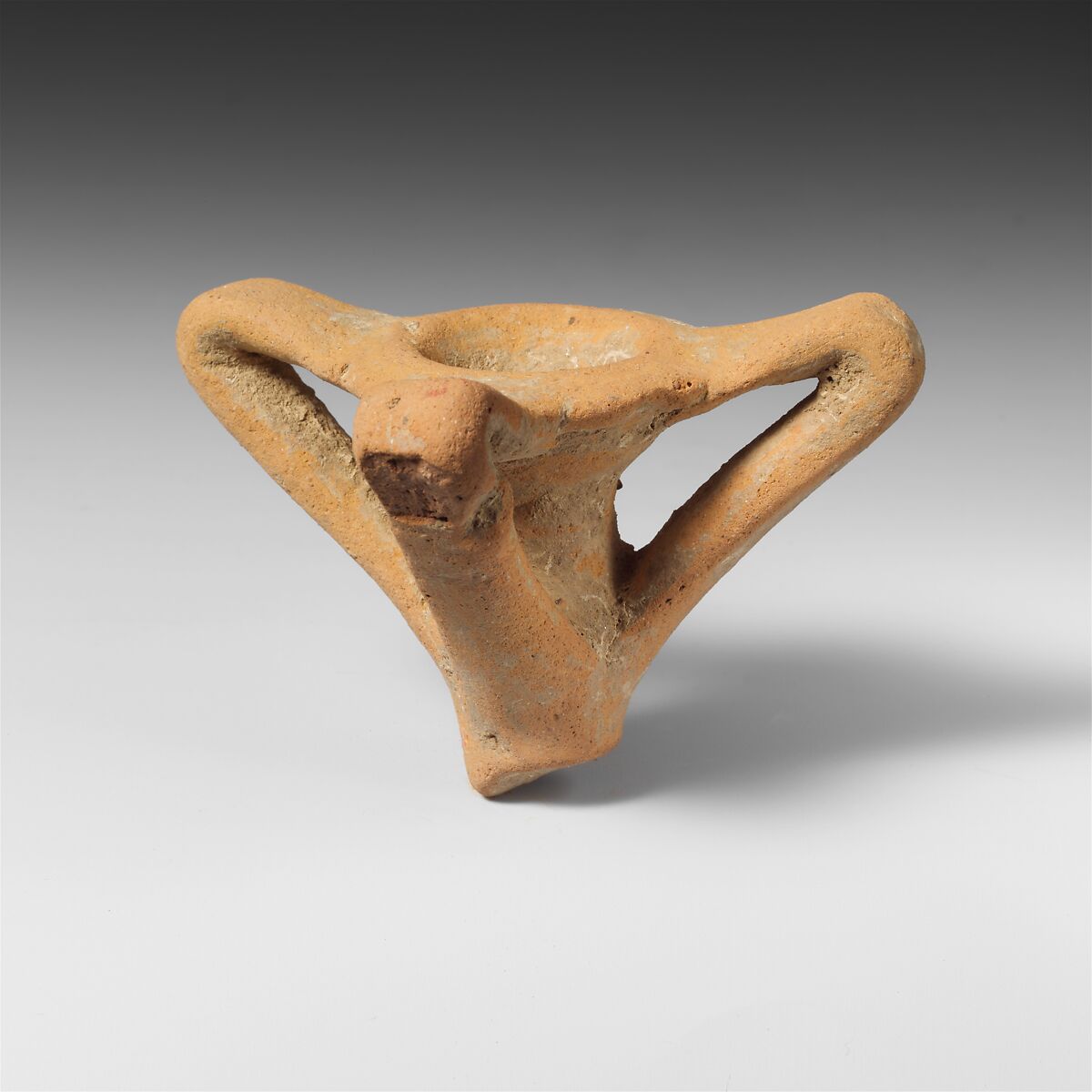 Terracotta finial with three flanges, Terracotta, Greek, Laconian 