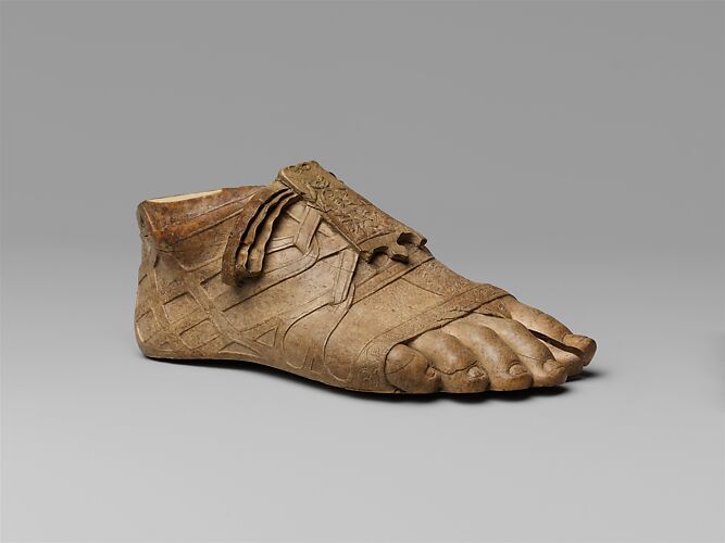 Ivory sandaled foot