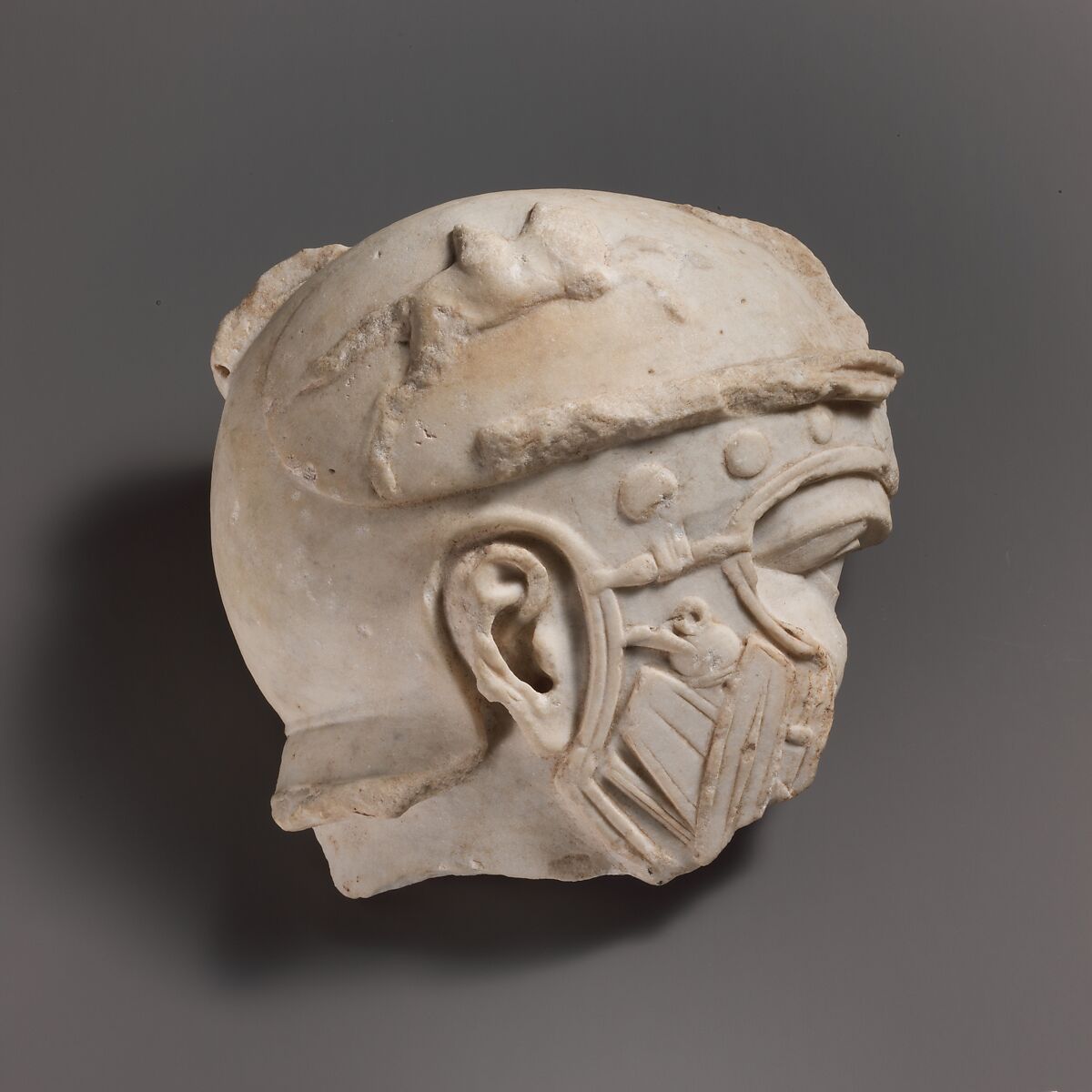 Fragmentary marble head of a helmeted soldier, Marble, Roman 