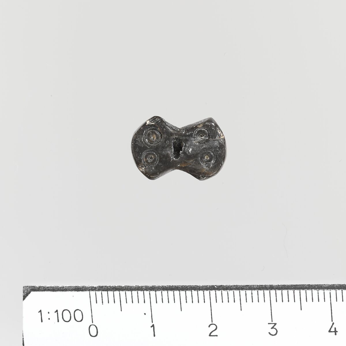 Steatite seal in the form of a double-axe, Steatite, Minoan