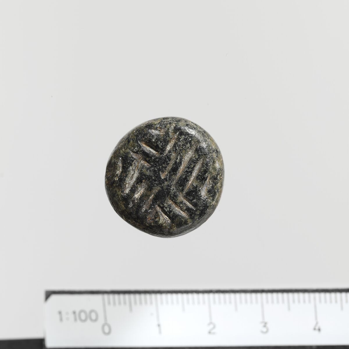 Serpentine conoid seal, Steatite, Minoan 