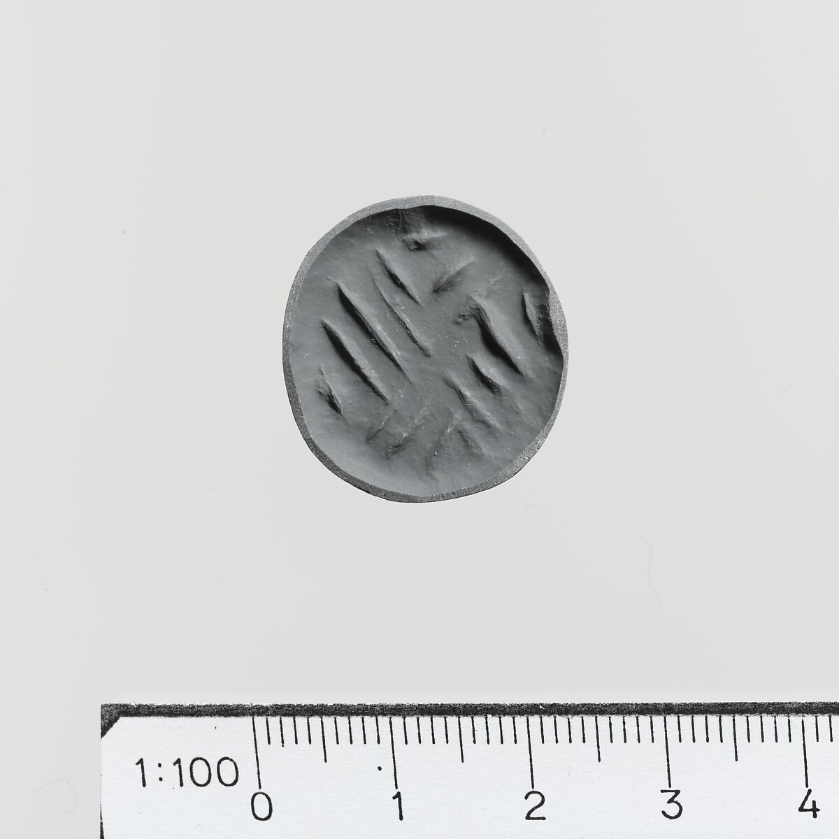 Serpentine conoid seal, Steatite, Minoan