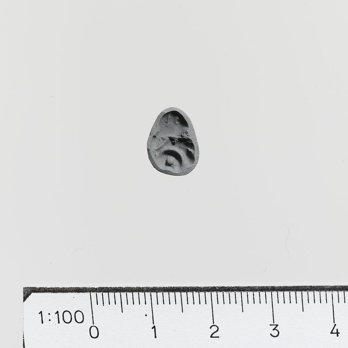 Seal, loop-handled signet, Steatite, Minoan