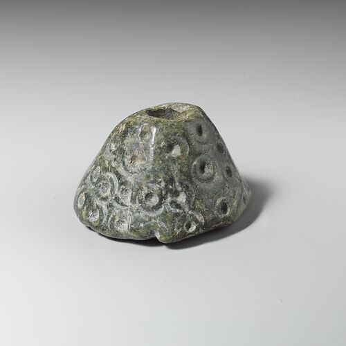 Steatite spindle whorl