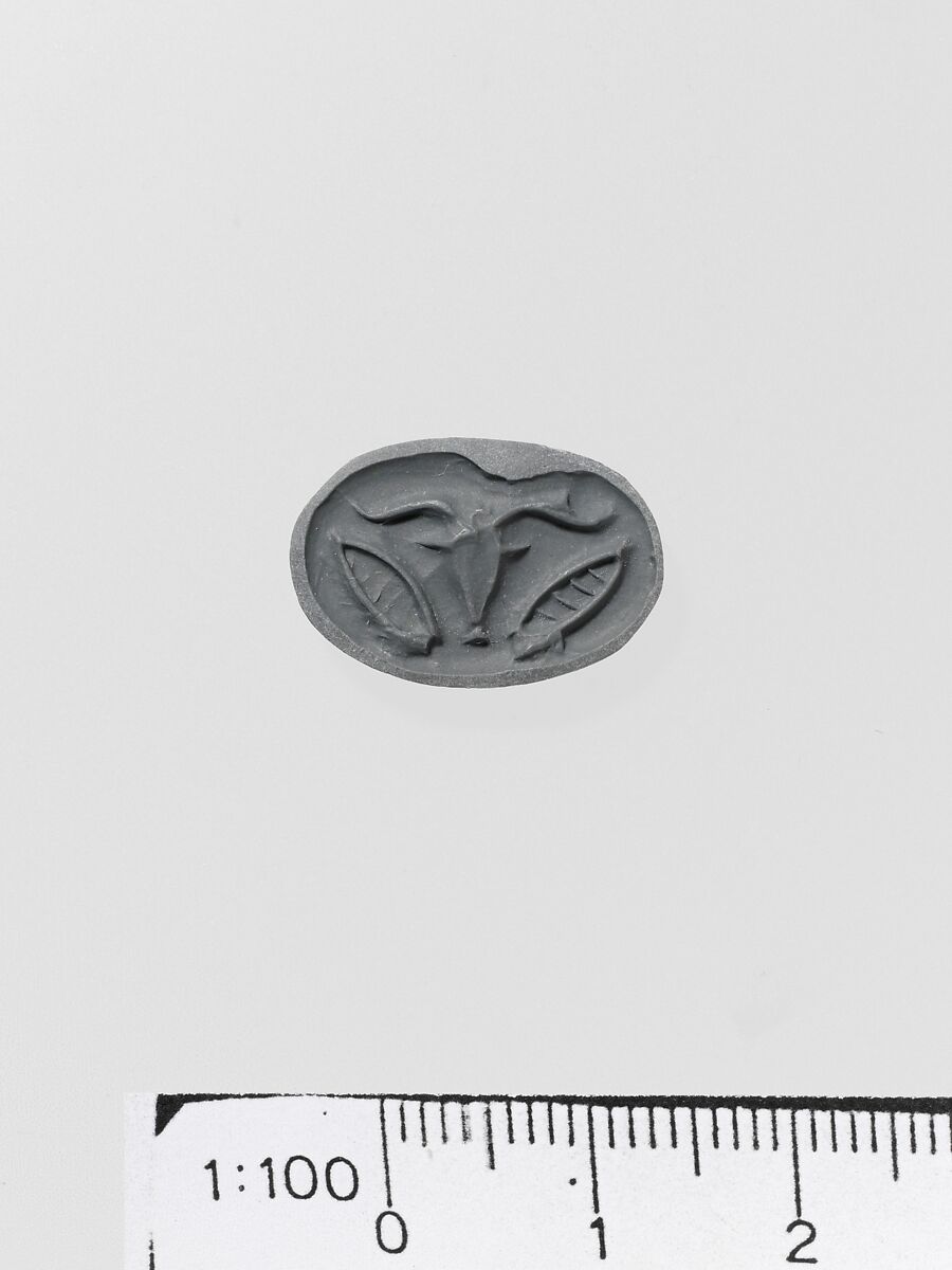 Steatite triangular prism, Serpentine (burnt), Minoan