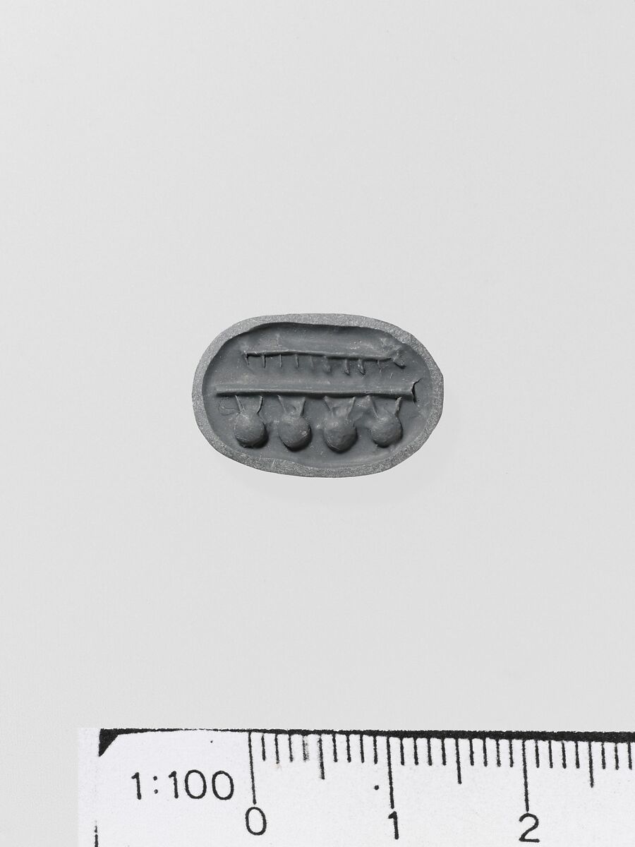 Steatite triangular prism, Serpentine (burnt), Minoan