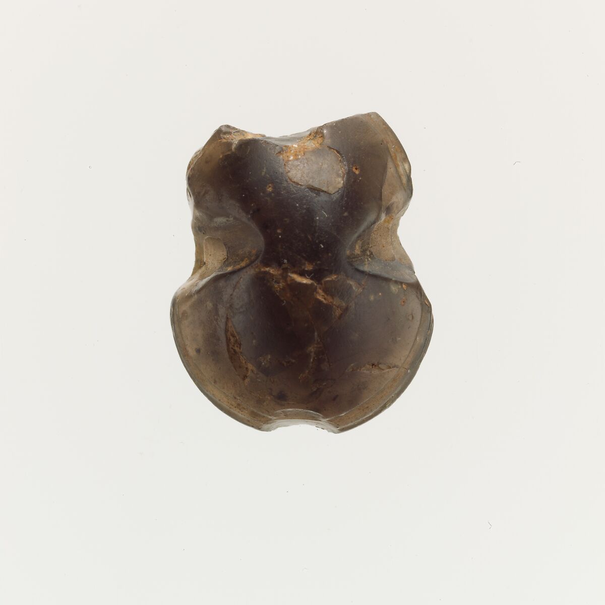Obsidian bead in the form of of a figure-of-eight shield, Obsidian, Minoan 
