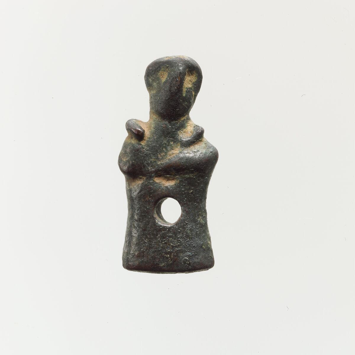 Bronze pendant in the form of a human figure, Bronze, Cretan 