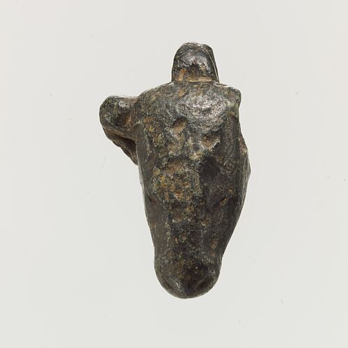 Steatite (?) pendant in the form of a bull's head