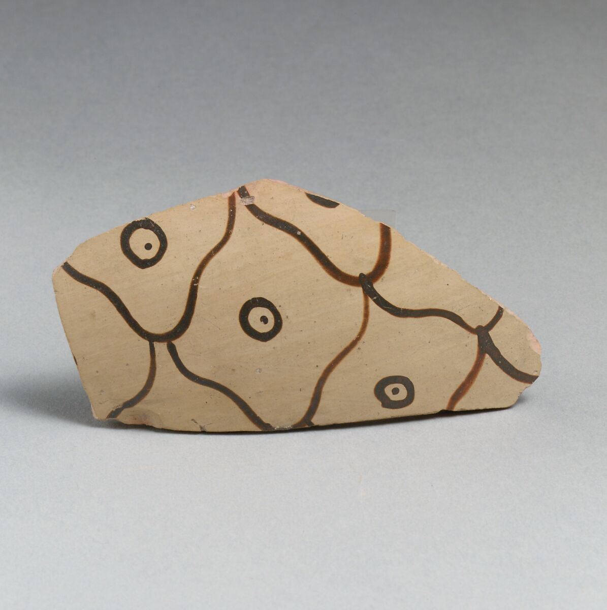 Terracotta vessel fragment with net pattern and dots within circles, Terracotta, Mycenaean 