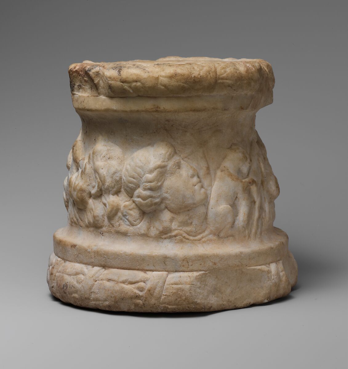 Marble round altar with a frieze of animals and masks, Marble, Roman 