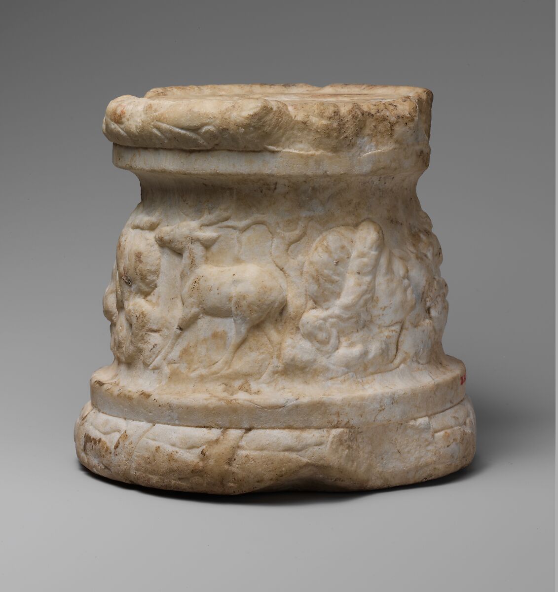 Marble round altar with a frieze of animals and masks, Marble, Roman