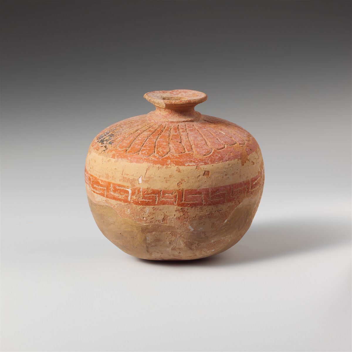 Terracotta aryballos (oil flask) in the form of a pomegranate, Terracotta, Lydian 