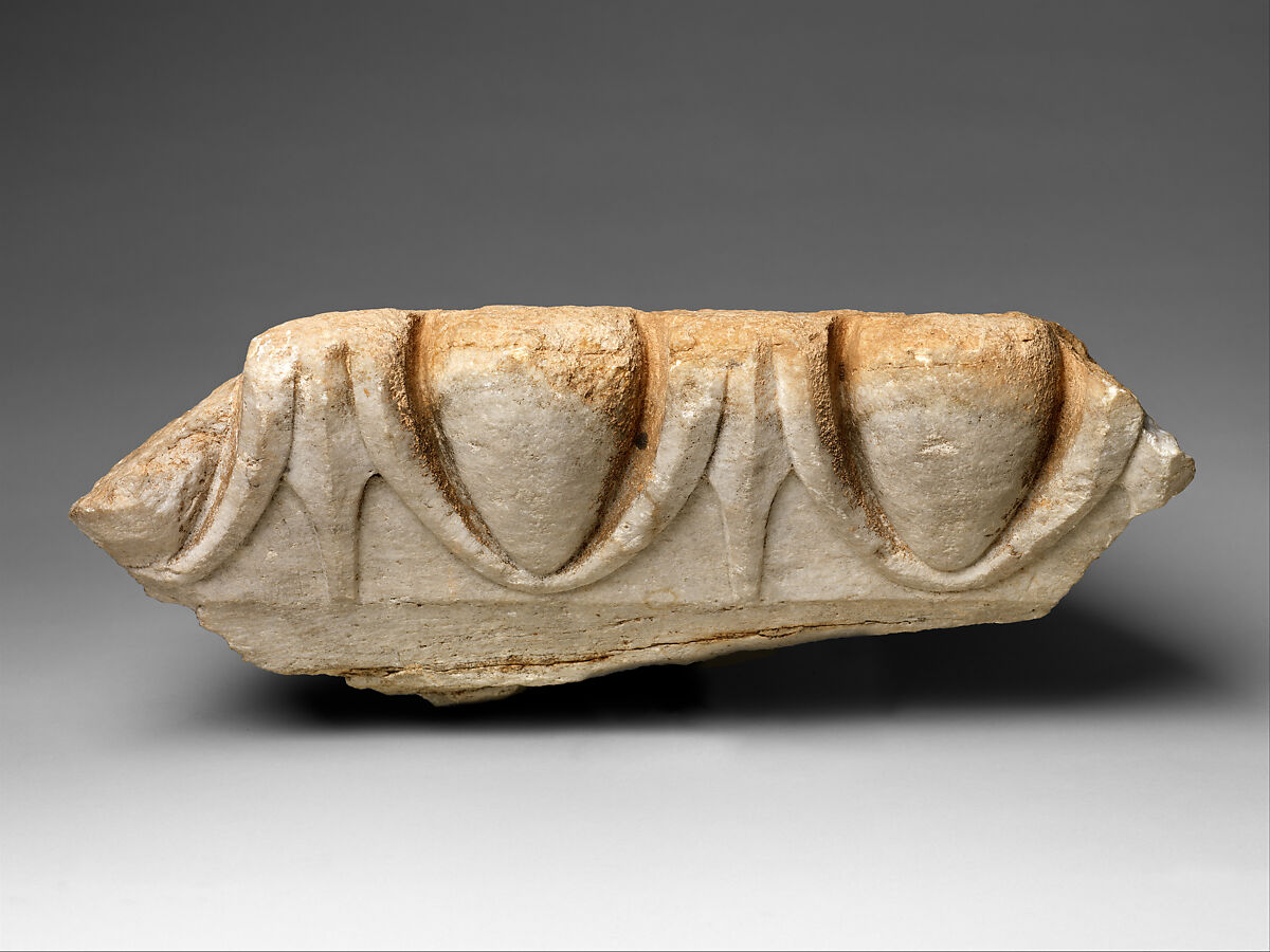 Marble fragment of an  Ionic column capital from the Temple of Artemis at Sardis, Marble, Greek or Roman 