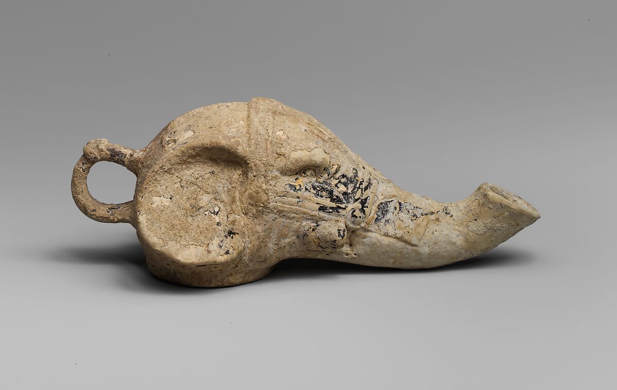 Terracotta lamp in the form of an elephant's head, Terracotta, Greek, Sicilian 