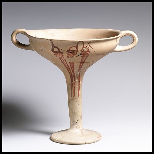 Terracotta kylix (drinking cup) with whorl shells