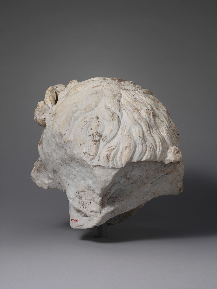 Marble head of a deity, Marble, Roman