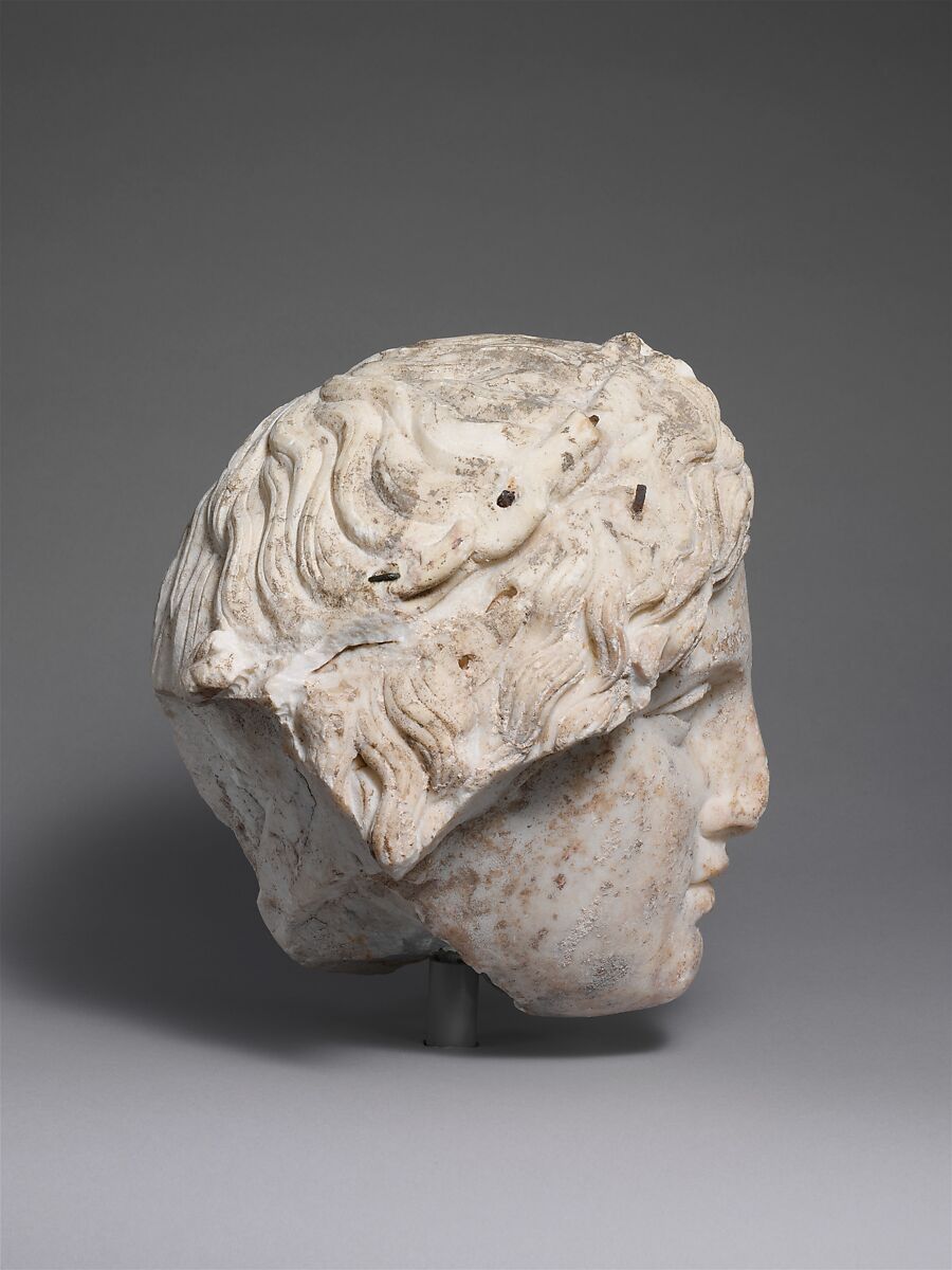 Marble head of a deity, Marble, Roman