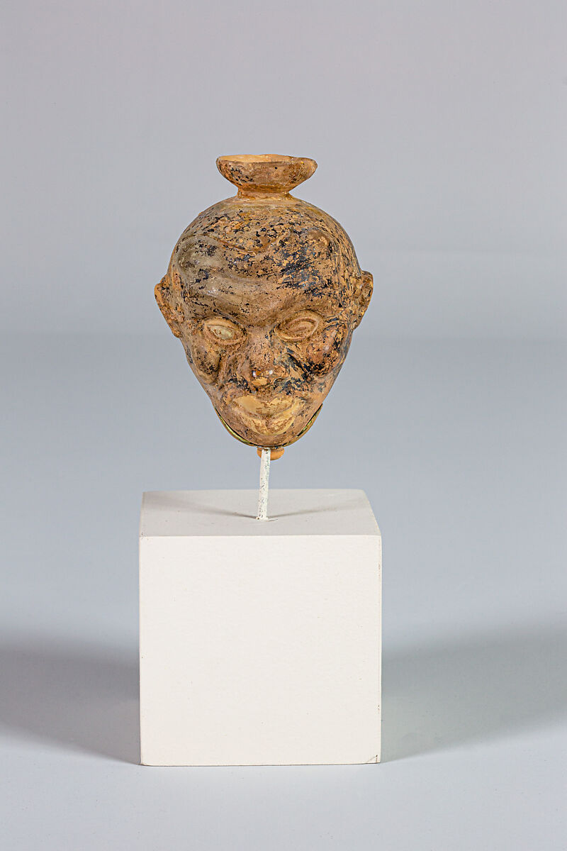 Terracotta aryballos (oil flask) in the form of two Black African heads, Terracotta, Greek, Attic 