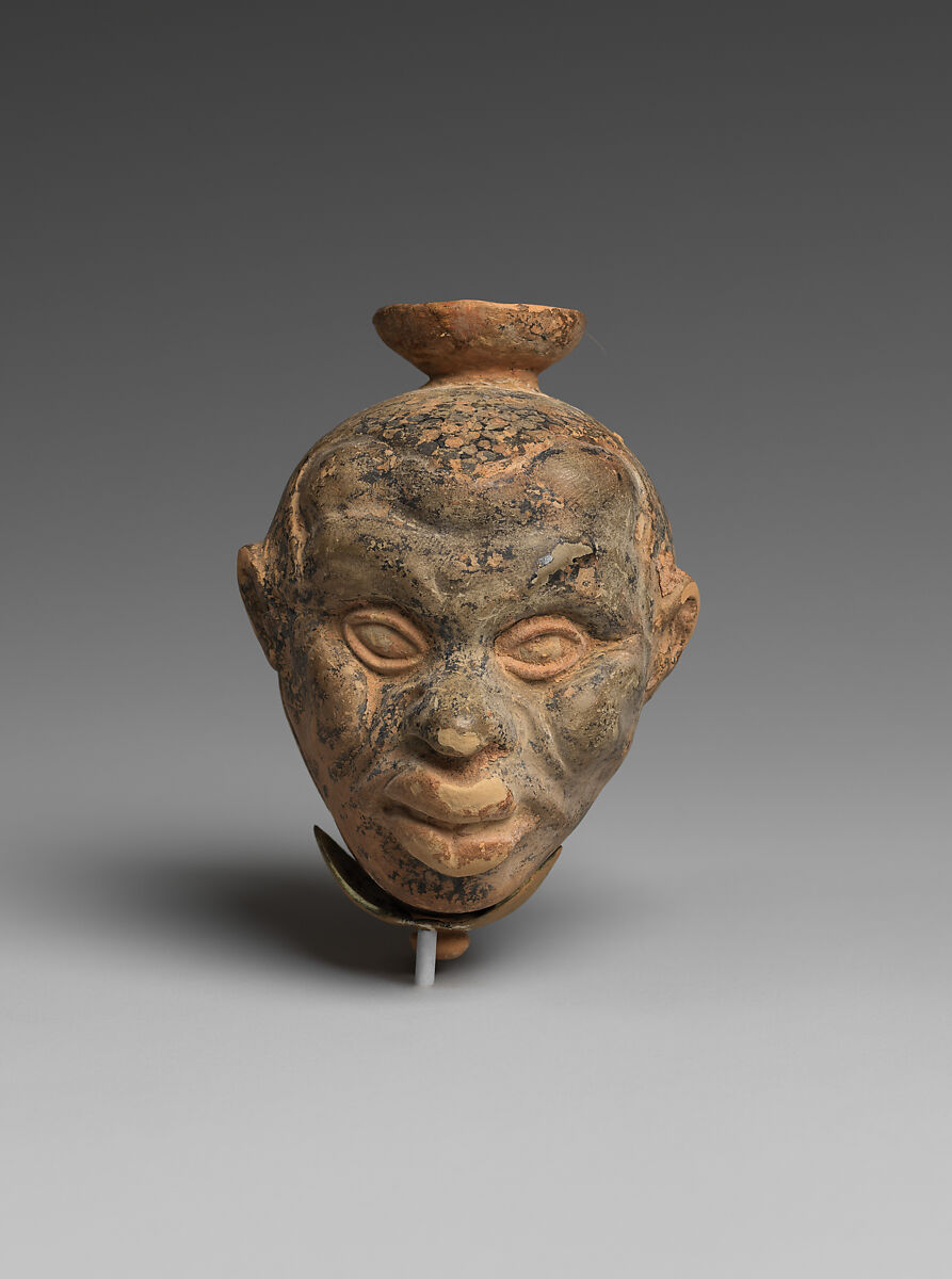 Terracotta aryballos (oil flask) in the form of two Black African heads, Terracotta, Greek, Attic