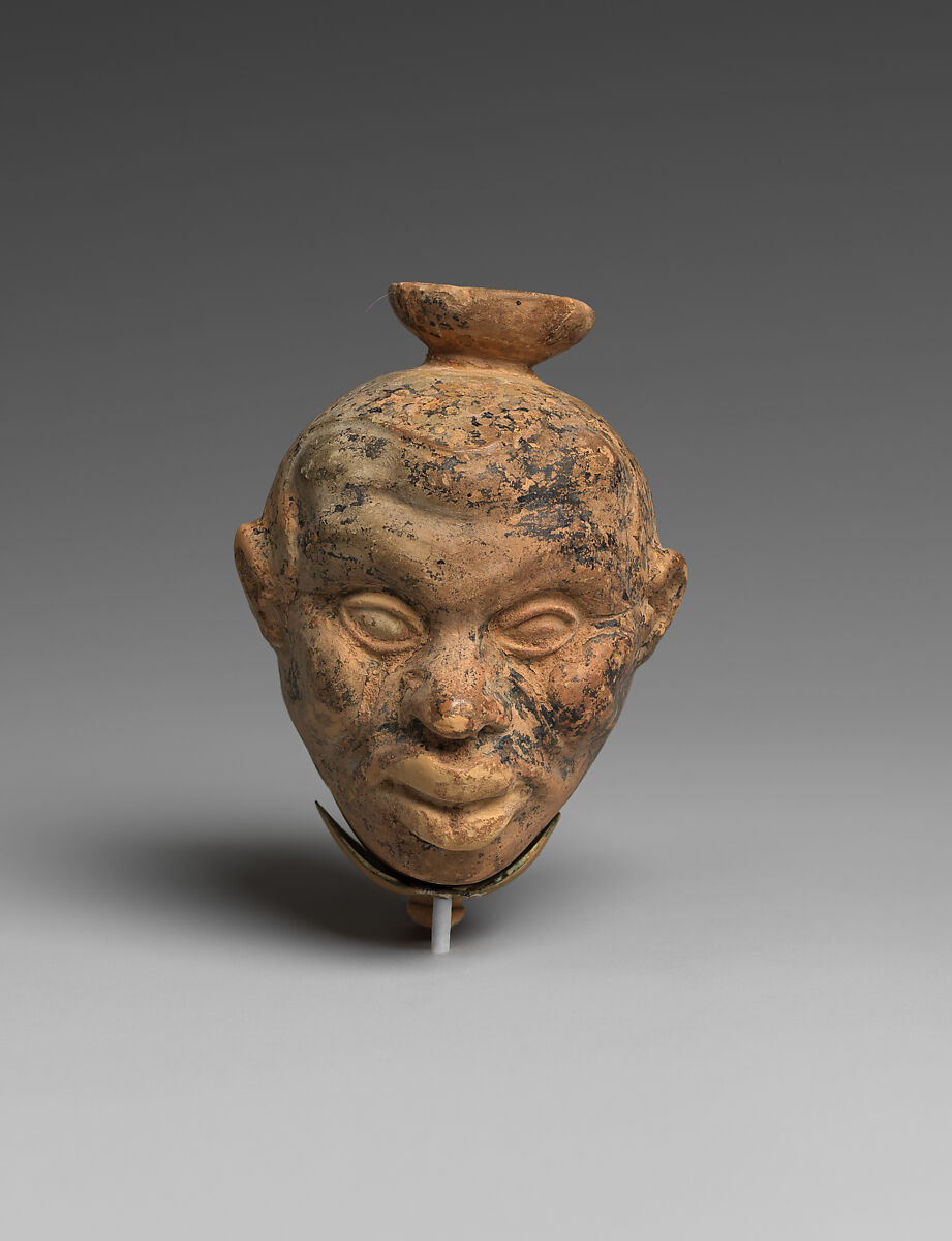 Terracotta aryballos (oil flask) in the form of two Black African heads, Terracotta, Greek, Attic