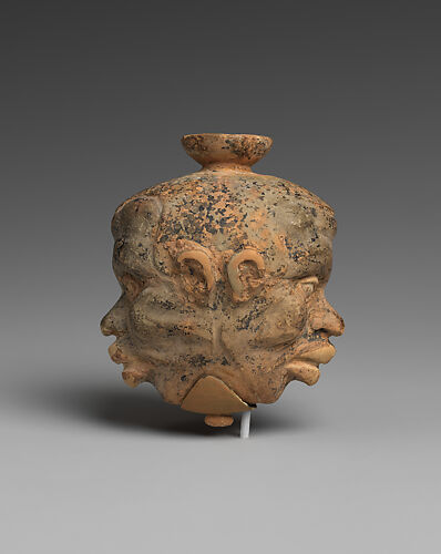 Terracotta aryballos (oil flask) in the form of two Black African heads