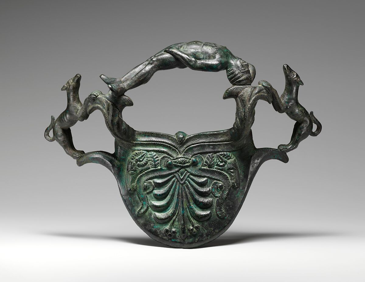 Bronze handle with dogs flanking a reclining youth, Bronze, Etruscan