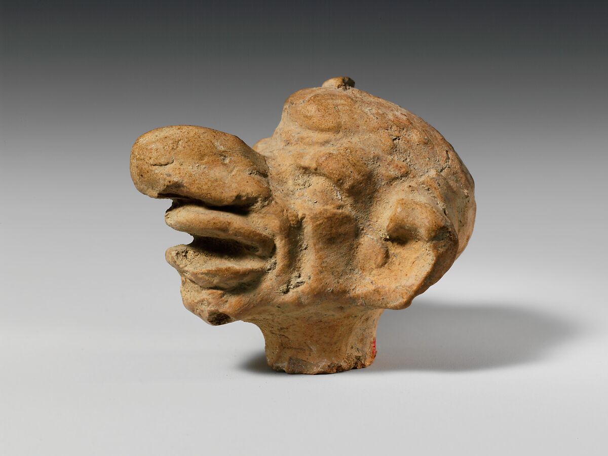 Terracotta grotesque head, Terracotta, Greek, Asia Minor 