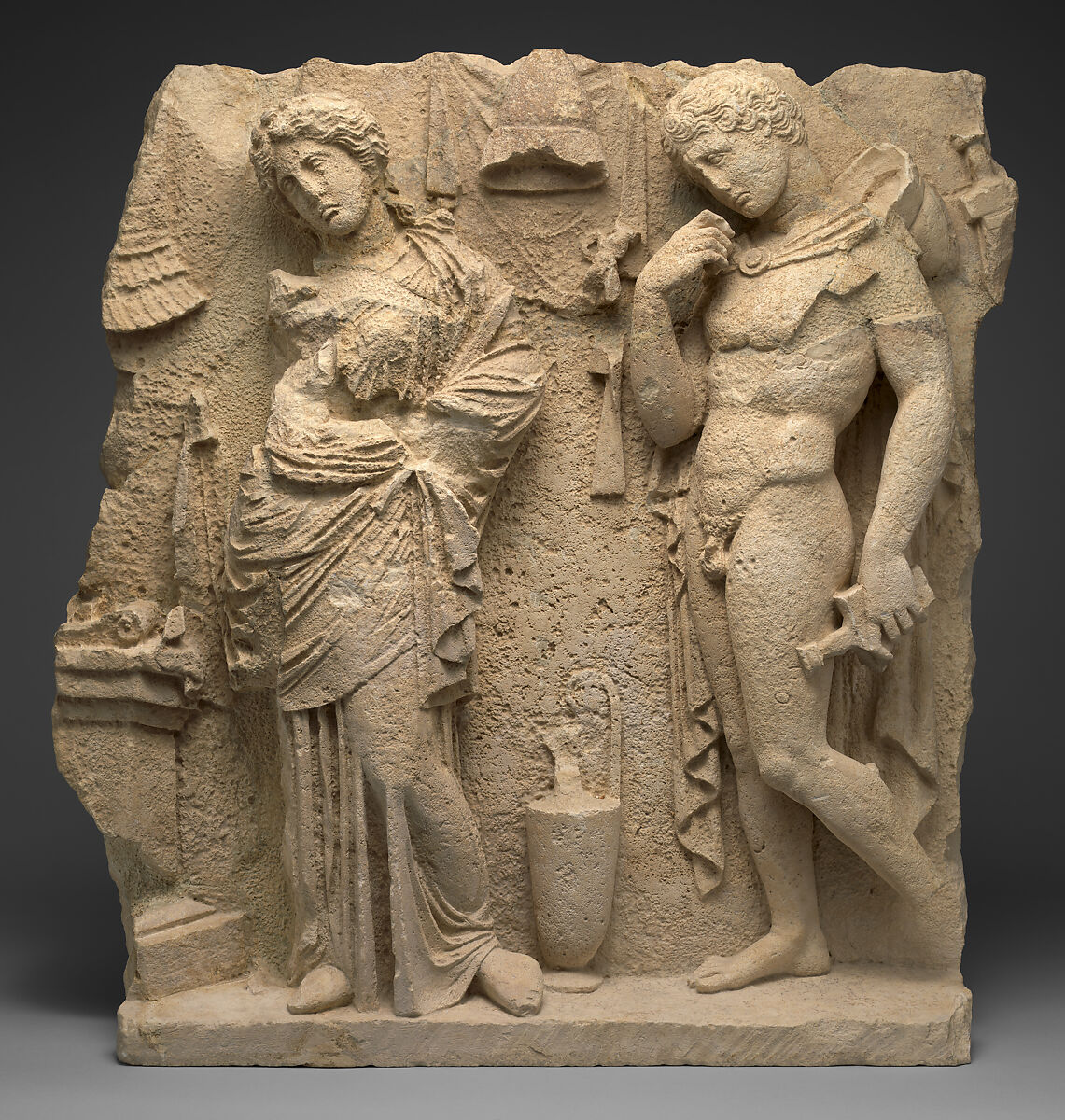 Limestone funerary relief